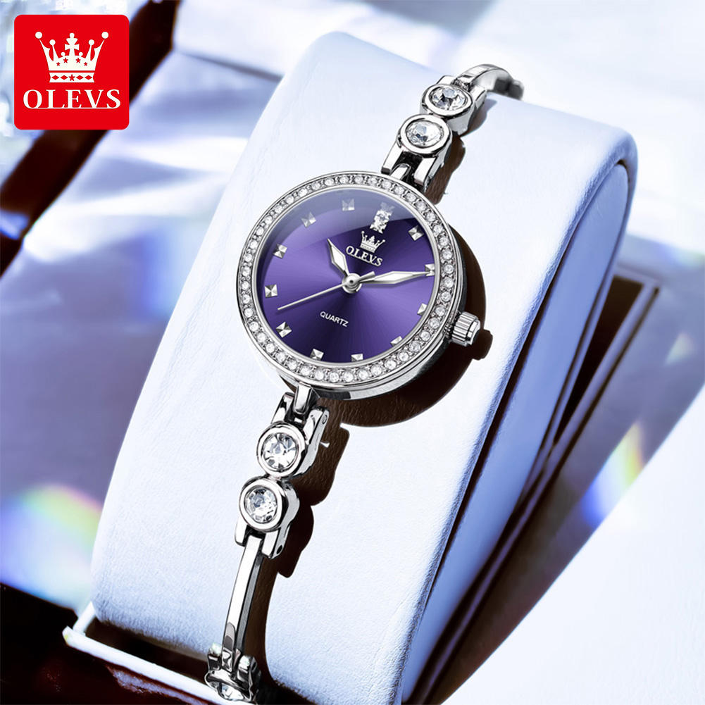 OLEVS 5670 Luxury Women’s Quartz Watch with Diamond-Encrusted Free Adjustment Bracelet Fashionable Glass Dial Window.